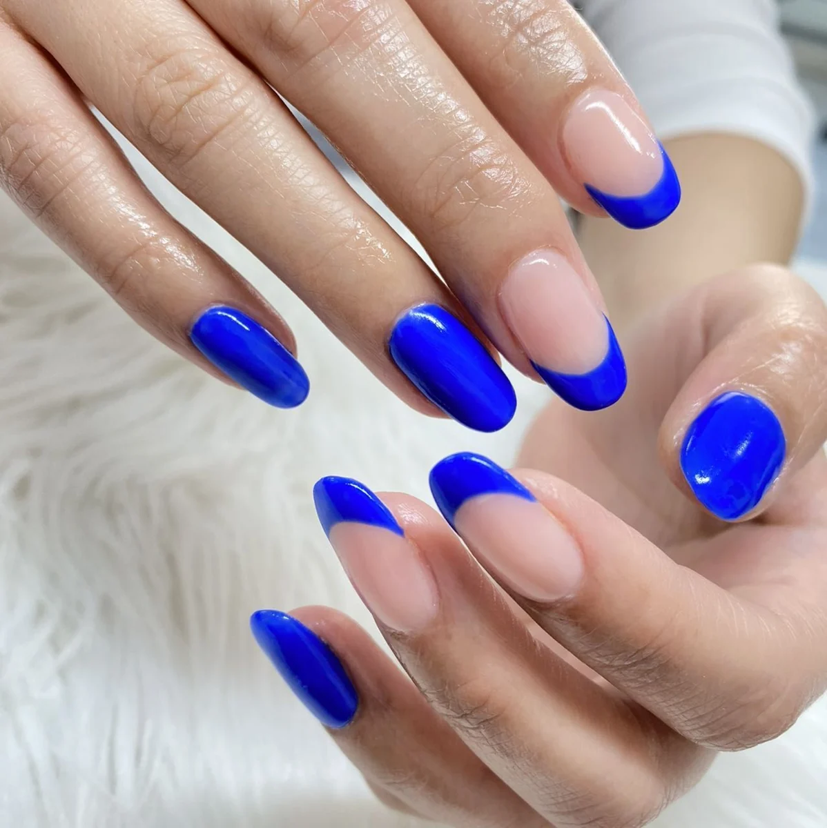 Cobalt blue French tips and glossy blue nails by Piccolo Nails